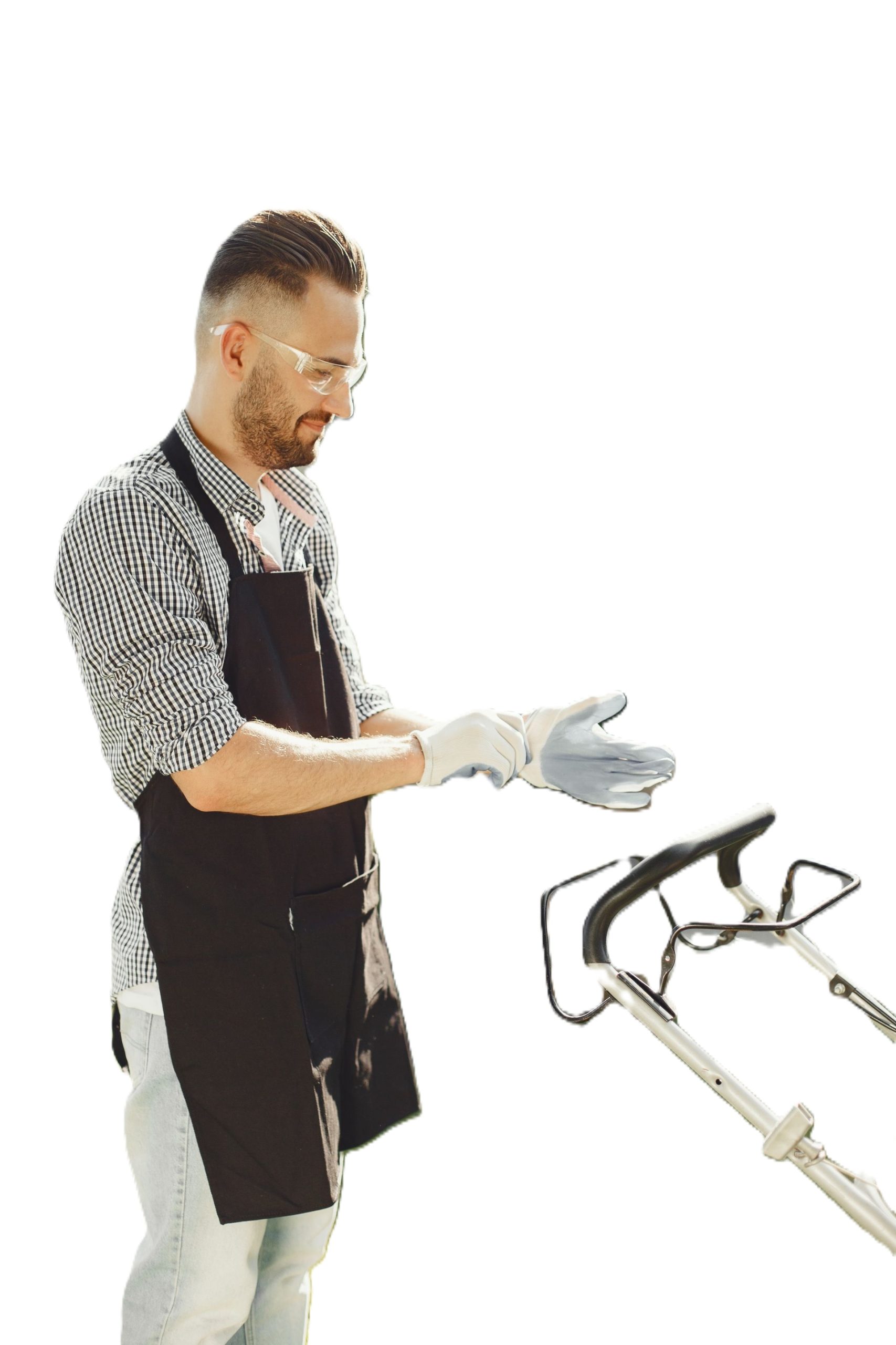 Handyman in an apron, safety glasses and work gloves, ready for a job in a London home